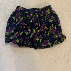 Girls dark blue skirt with purple flowers